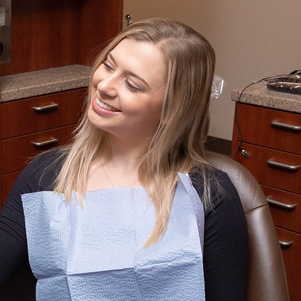 One of our Hawley Lane Dental patients smiling in the dental office